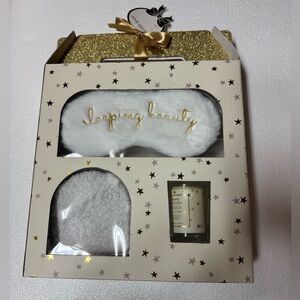 Tri-Coastal Design
Sleep Mask, Cozy Socks, And Candle Gift Set